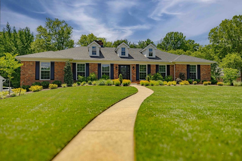 Greenville Delaware home with curved walkway and finished front landscaping